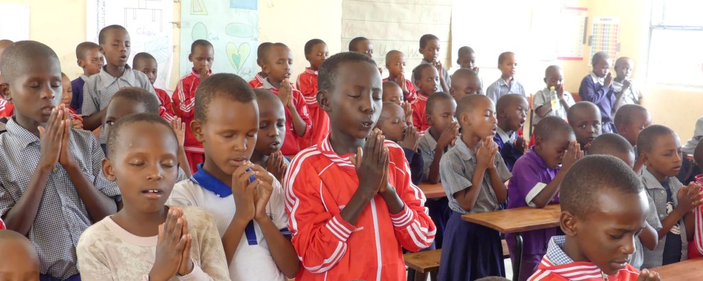 Tumaini School Students Praying
